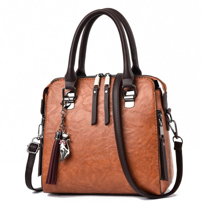 Sac à main chic femme en cuir avec bretelle moderne