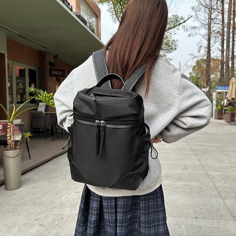 Sac à dos multifonctionnel pour homme avec compartiments spacieux et poches latérales en filet 3