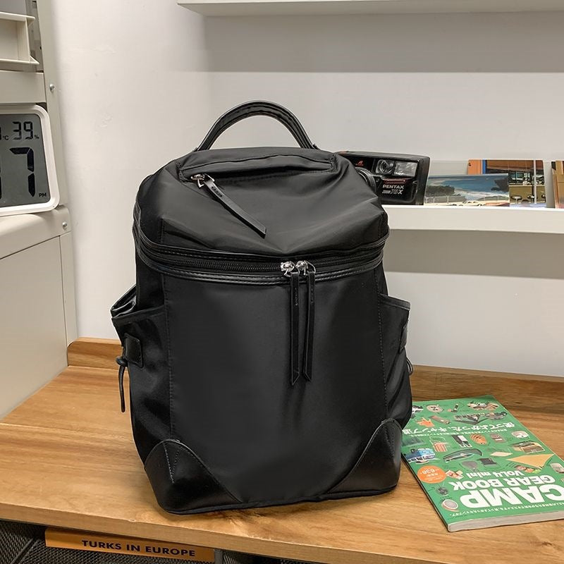 Sac à dos multifonctionnel pour homme avec compartiments spacieux et poches latérales en filet 8