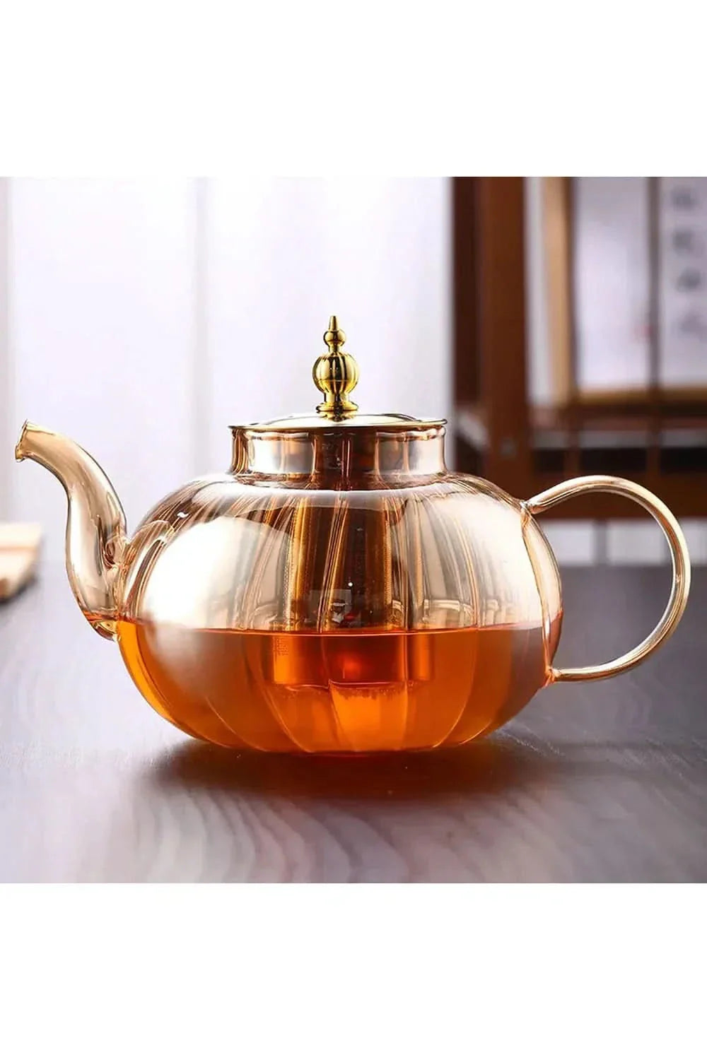 Théière en verre avec infuseur pour un service élégant 1