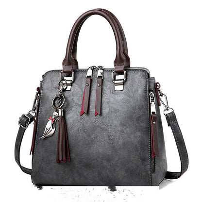 Sac à main chic femme en cuir avec bretelle moderne