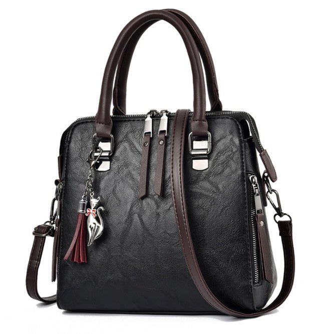 Sac à main chic femme en cuir avec bretelle moderne