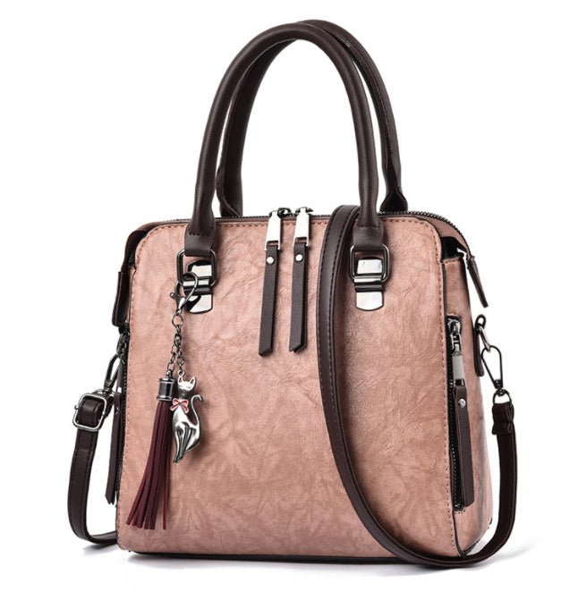 Sac à main chic femme en cuir avec bretelle moderne