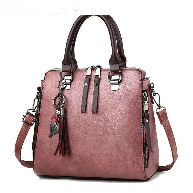 Sac à main chic femme en cuir avec bretelle moderne