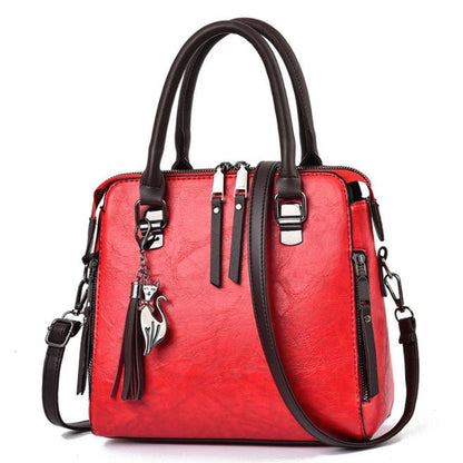 Sac à main chic femme en cuir avec bretelle moderne