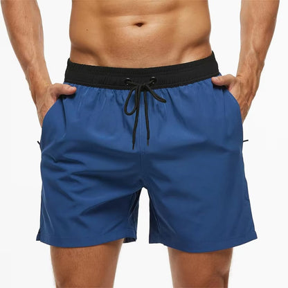 Shorts de sport et plage légers avec poches zippées